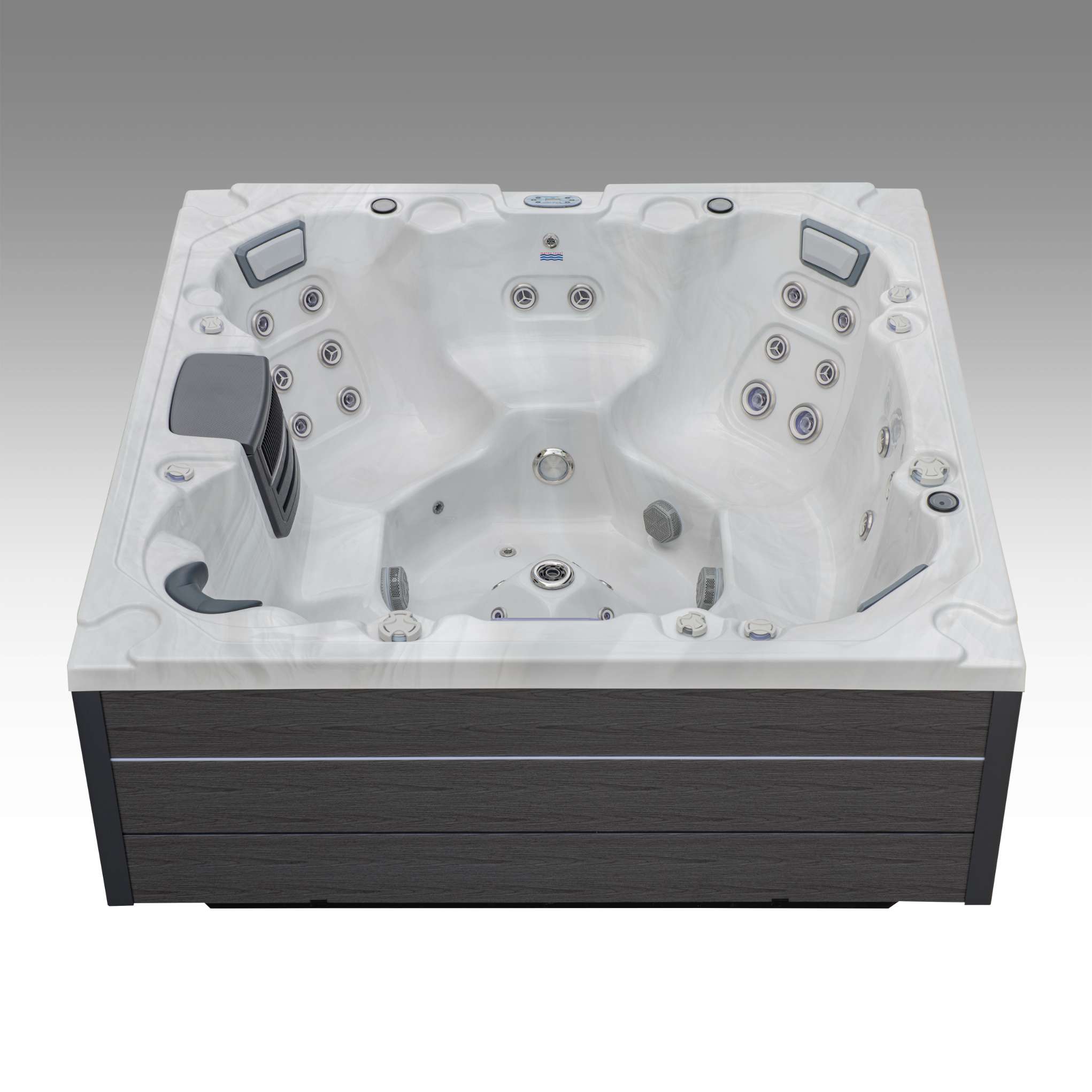 Front-facing view of the Oasis hot tub displaying dual loungers with targeted massage jets.