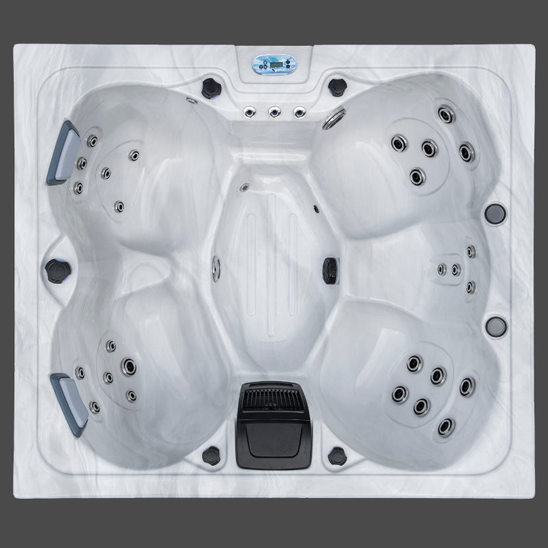 Overhead view of the empty Aurora hot tub highlighting the jet configuration and interior contours.