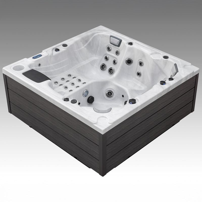 Corner perspective of the Fjord hot tub showing lounge seating and upper jet placements.