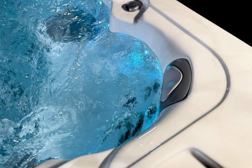 Close-up of ergonomic hydrotherapy seat with water movement inside the Fossa 3B spa.