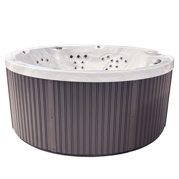 Round Harmonic hot tub with dark HDPE panel exterior and white acrylic interior.