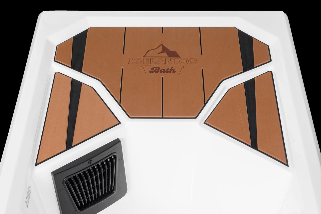 Overhead view of the Icelandic Bath showing the full teak-color deck panel layout with black accent lines.