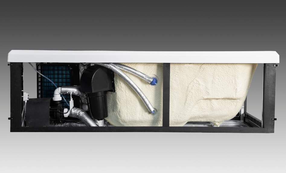 Side view of Icelandic cold plunge internal plumbing and foam insulation around the tub shell.
