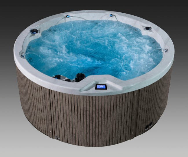 Icelandic Cyclone 3 round hot tub showing intense water movement and active jet streams.