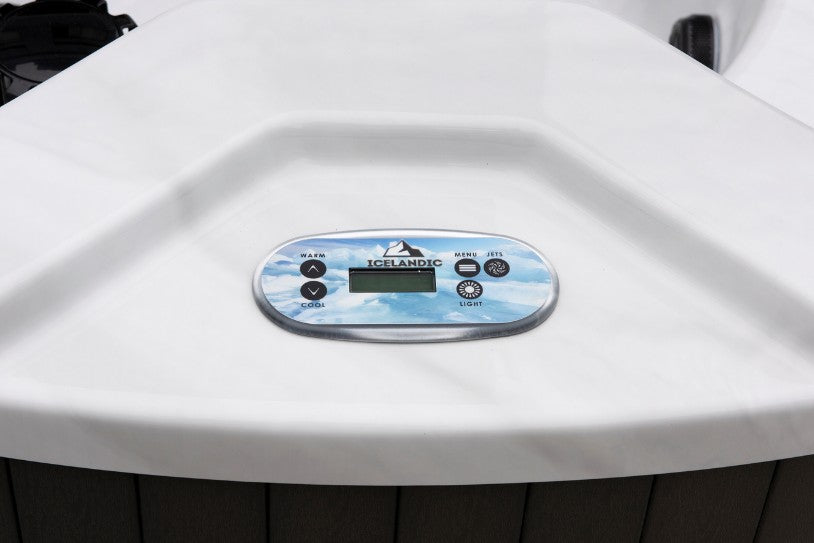 Digital control panel of the Icelandic Wellness Cyclone 1 hot tub mounted on the acrylic shell.