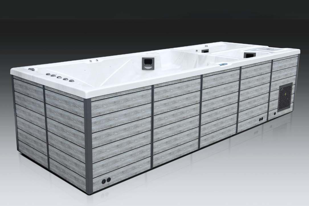 Rear angle of the Triathlon 3-in-1 spa showcasing the swim zone and dual therapy chambers.