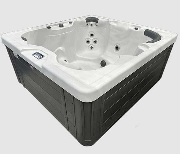 Side-angle view of the H167Bpp hot tub showing exterior cabinet panels and contoured white acrylic interior.