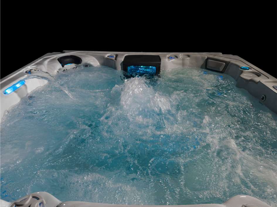 Front interior view of the Oasis hot tub showing powerful jet action and LED lighting.