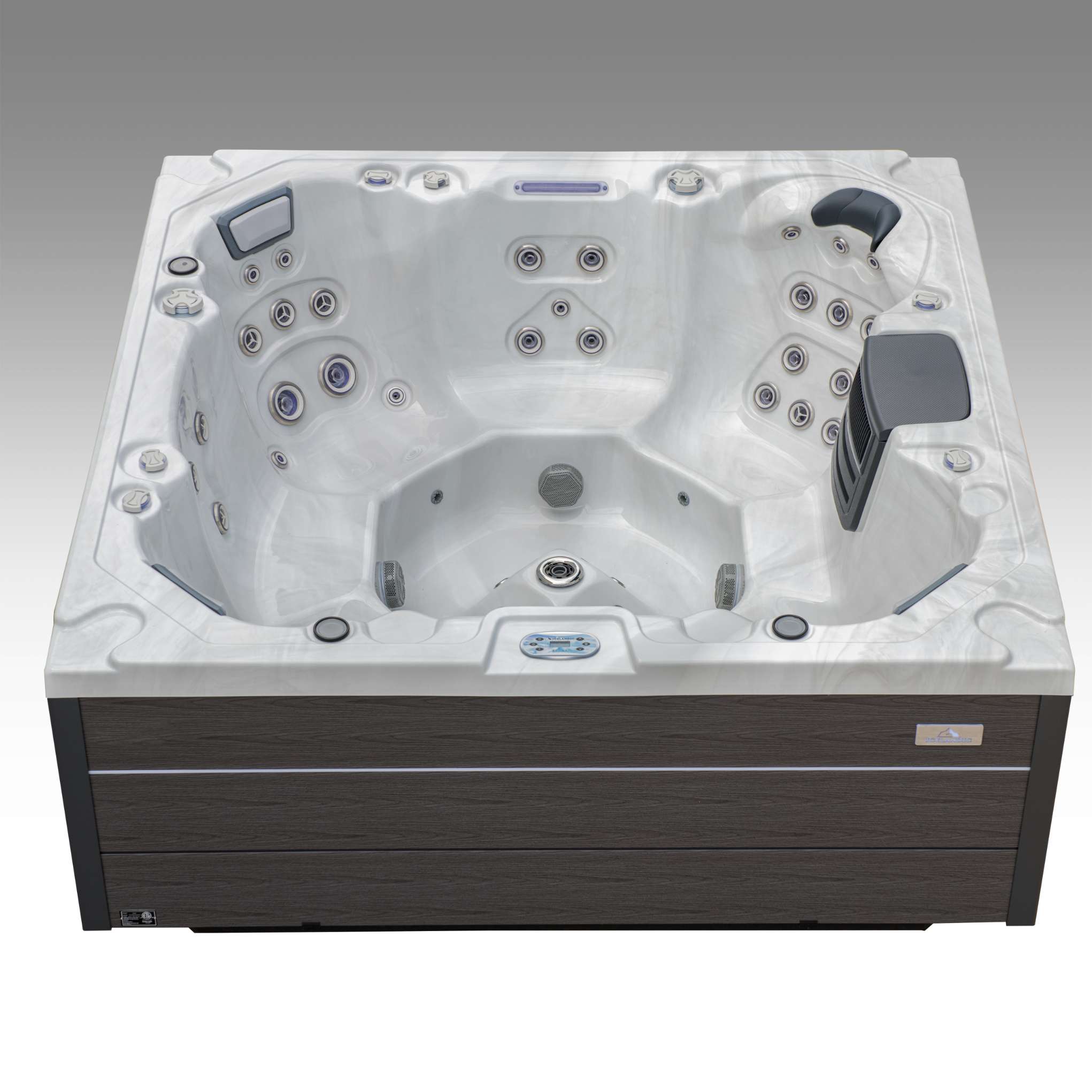 Three-quarter profile of the Oasis hot tub focusing on seating depth and therapy jets.