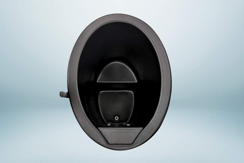 Front-facing view of a black oval plunge tub featuring an internal seat and drain.