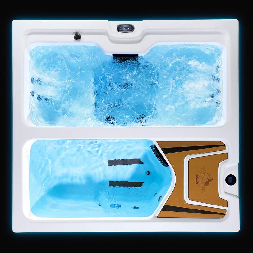 Fire & Ice dual-zone tub from above showing bright blue lighting and strong jet action.