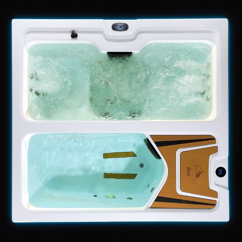 Top view of Fire & Ice tub glowing with green LED lighting and circulating water.