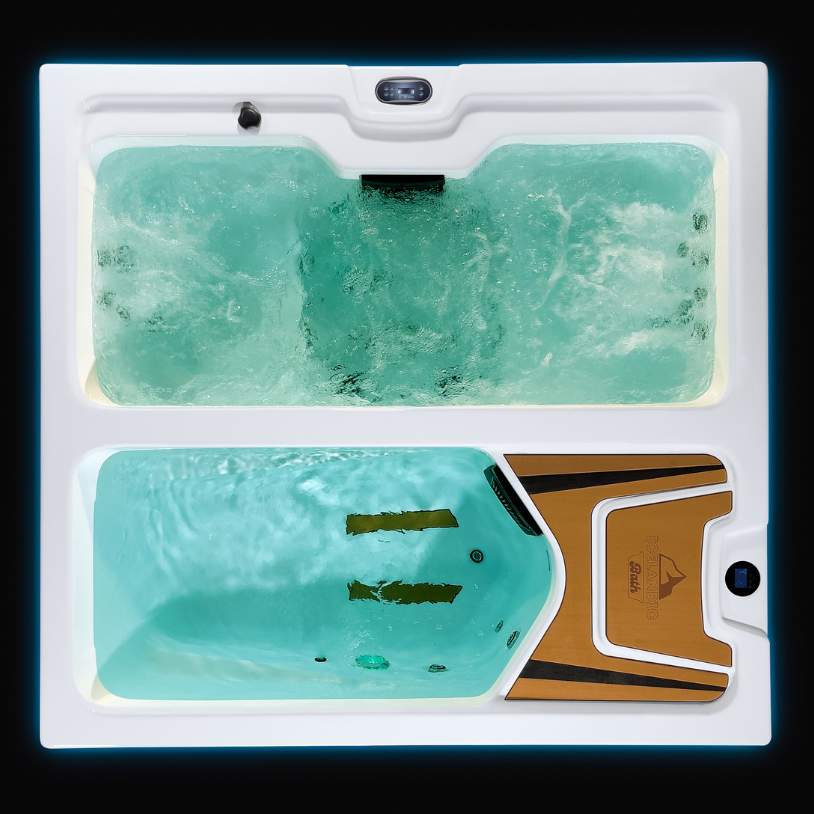 Fire & Ice dual-zone tub in green lighting showing active hydrotherapy and plunge area.