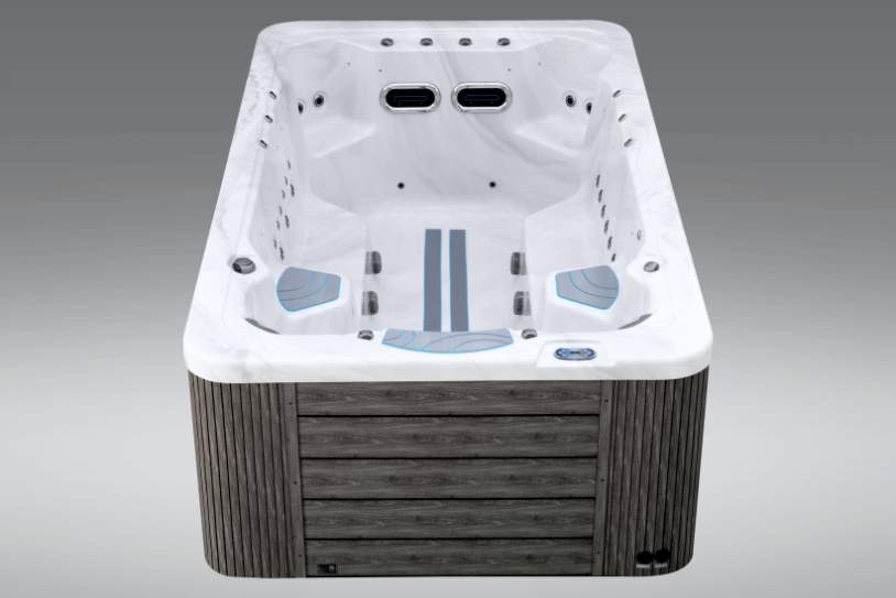 Front swim end of the Fossa 3B swim spa showing dual jet nozzles and spacious interior.