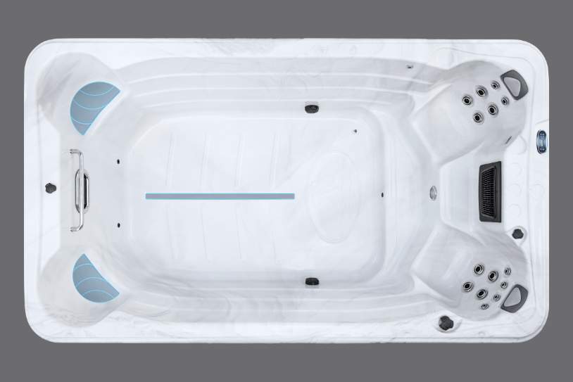 Fossa PP overhead view of the empty Icelandic Swim Spa shell showing contours, seating, and lane marker.