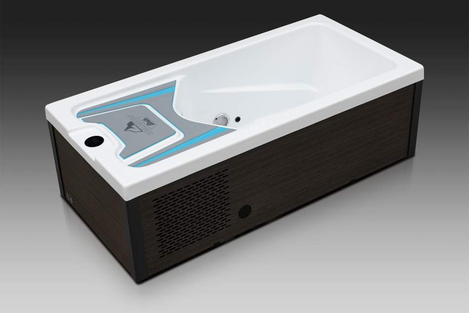 Rear-angle view of the Icelandic Bath cold plunge tub featuring drainage and textured top deck.