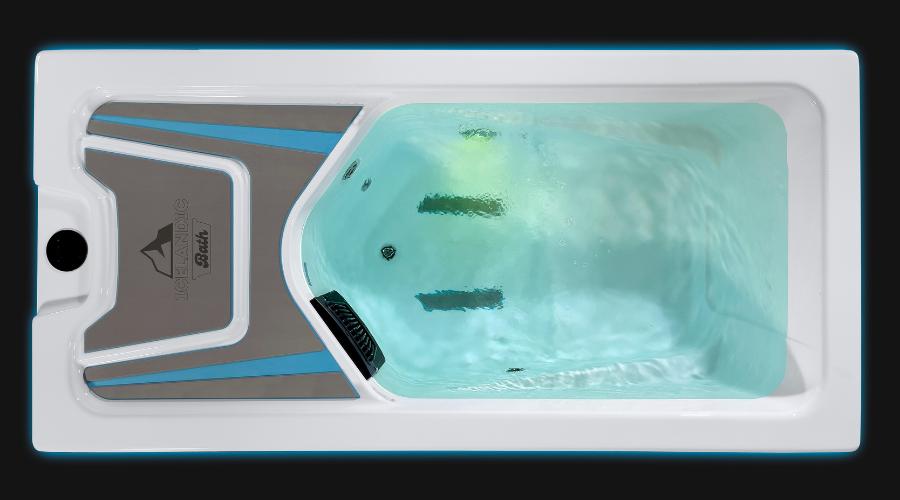 Top view of the Icelandic Bath cold plunge tub illuminated with green-toned LED lighting.