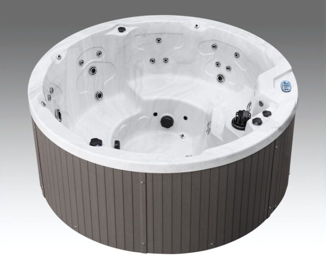 Angled view of the empty Icelandic Cyclone 1 hot tub interior showing jet placements and control panel.