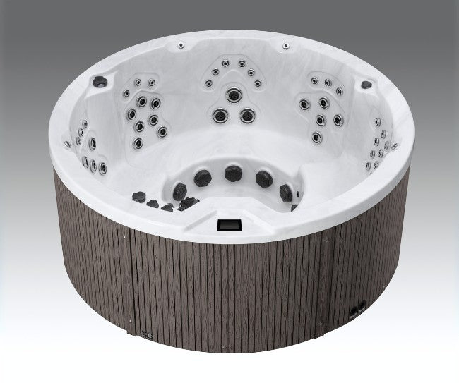 Interior view of empty Icelandic Cyclone 3 hot tub showcasing jet placement and ergonomic