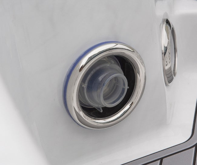 Close-up of a large stainless-steel hydrotherapy jet on the Icelandic Cyclone 3 hot tub.