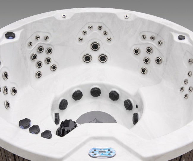 Round seating configuration of the Icelandic Cyclone 3 spa with high-density therapeutic jet placement.