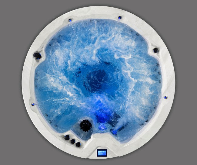 Overhead image of Icelandic Cyclone 3 hot tub showing light blue whirlpool effect.
