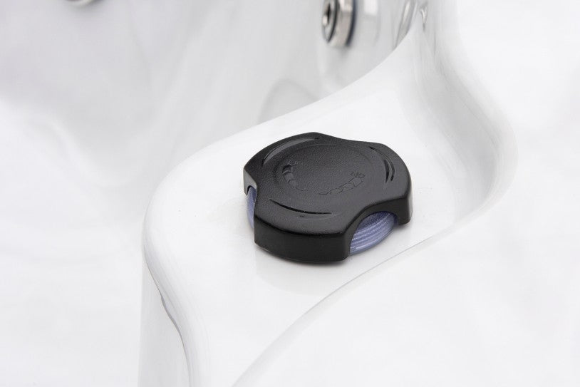 Close-up of the Cyclone 1 spa’s aromatherapy or air control cap on the edge of the shell.