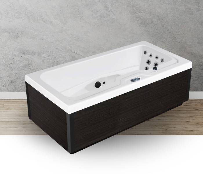 Icelandic Fire black-panel whirlpool tub displayed in a modern bathroom interior.
