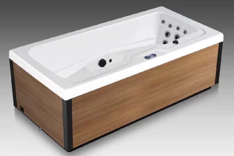 Icelandic Fire whirlpool bathtub with wood panel exterior and multi-jet hydrotherapy system.