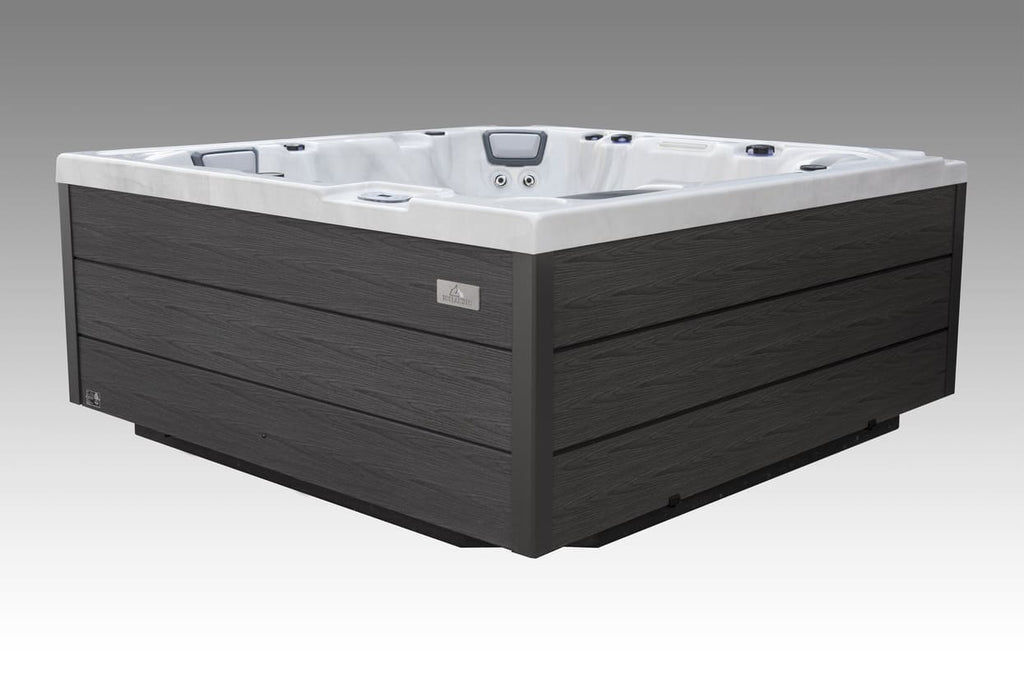 Icelandic Wellness Fjord hot tub shown from an angled exterior view with dark cabinet and white interior.