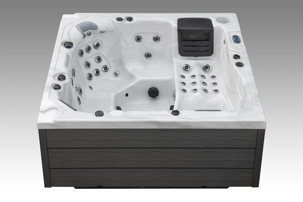 Side view of the Icelandic Wellness Fjord hot tub showing deep therapeutic seating and jet placement.