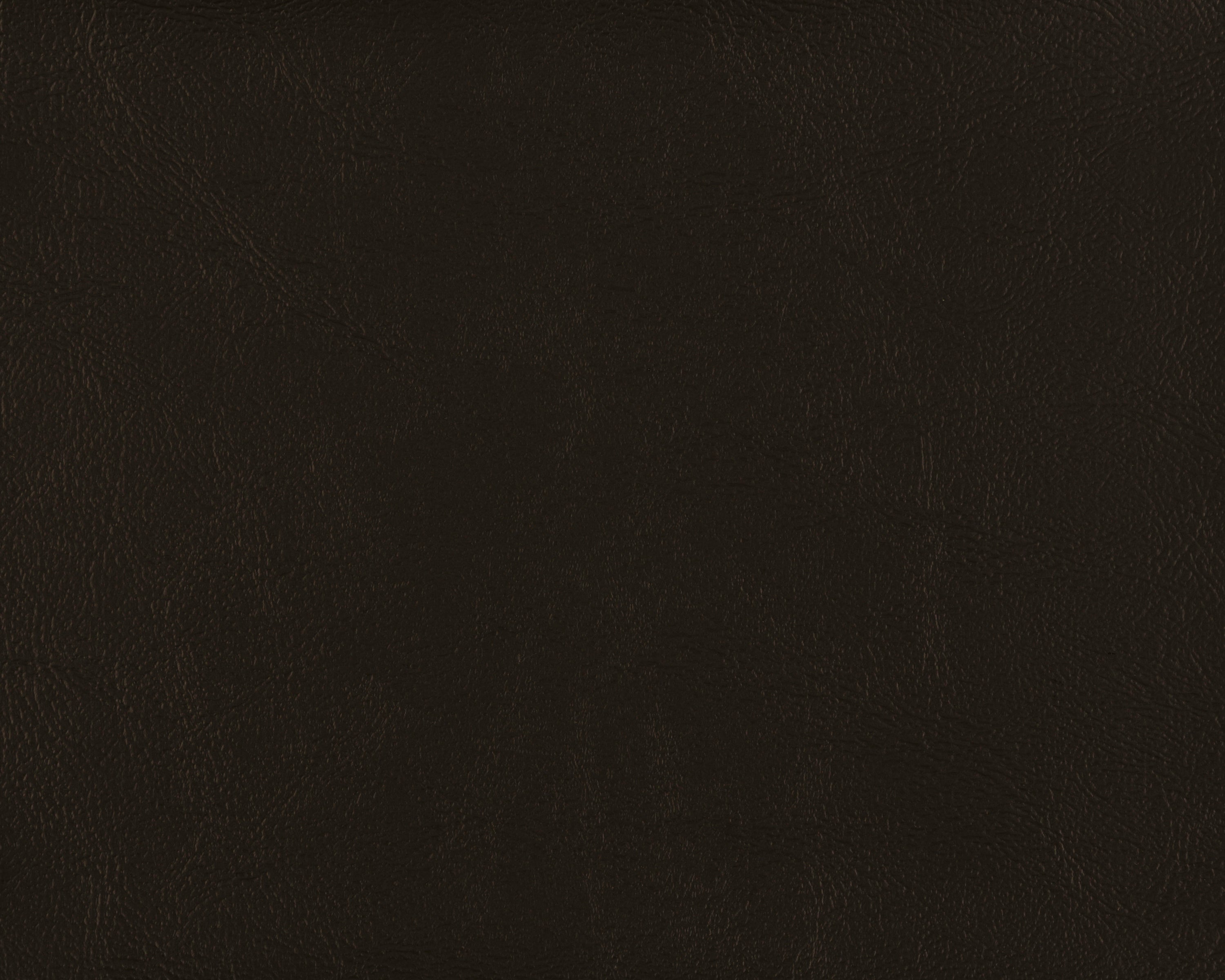 Black hot tub cover material sample for the Marquis Celebrity Vegas showing textured leather-like surface.