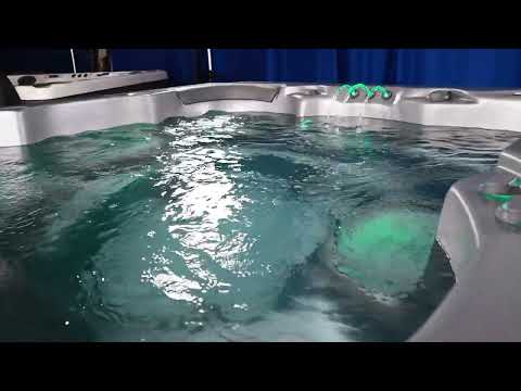Video walkthrough showcasing the features, seating layout, and jet system of the Harmonic Spas H288B hot tub.
