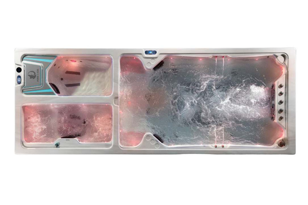 Triathlon 3-in-1 swim spa with red LED illumination over the swim zone, hot tub, and ice tub.