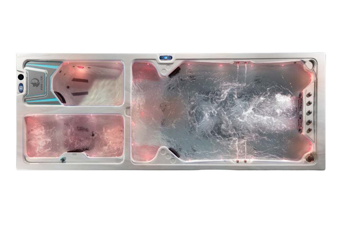 Triathlon 3-in-1 swim spa with red LED illumination over the swim zone, hot tub, and ice tub.